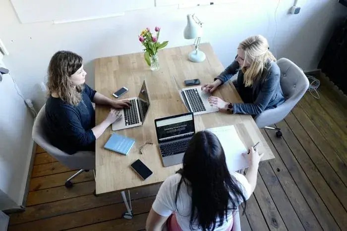People working together at a table.